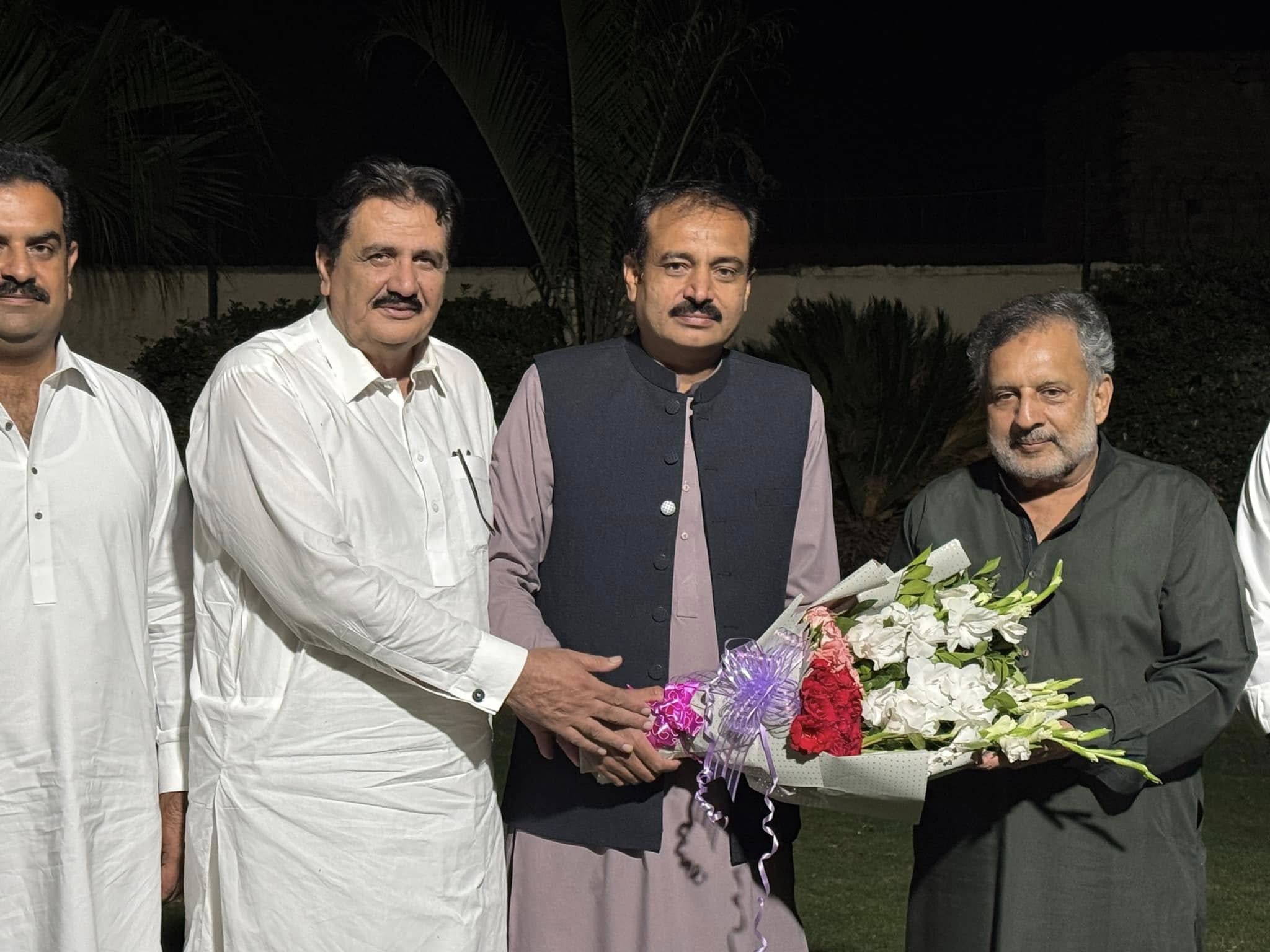 TCCI representatives presenting a bouquet to Dr Jawad Iqbal